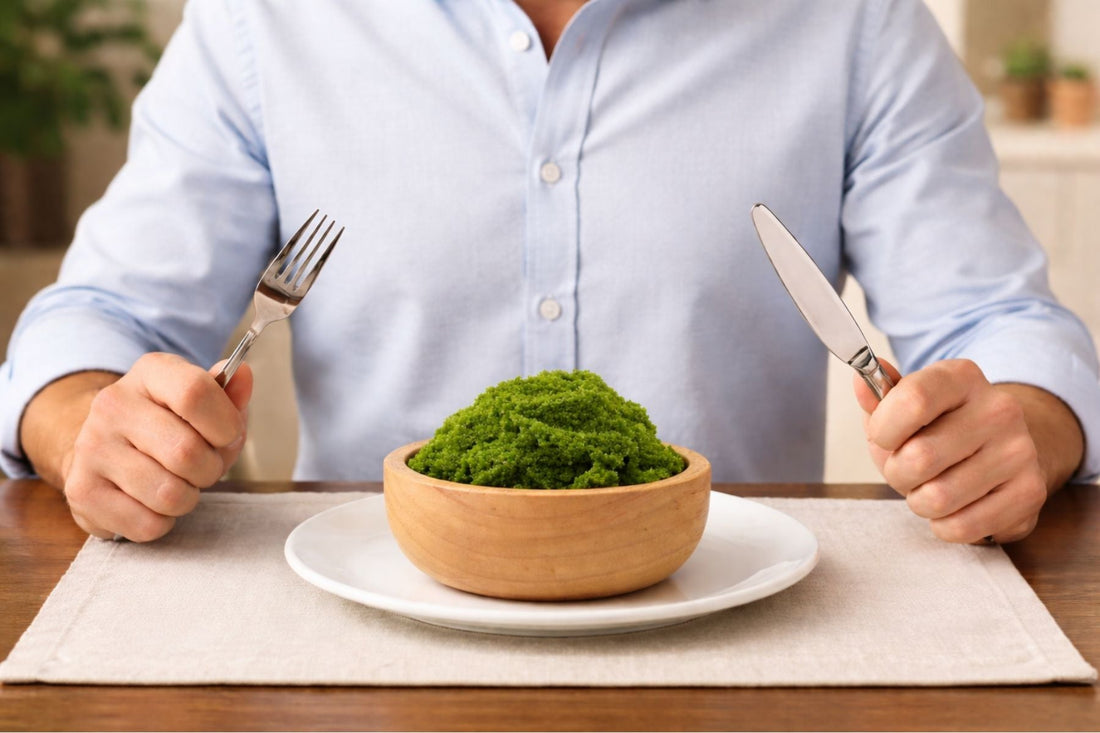 Person eating Wolffia at a table